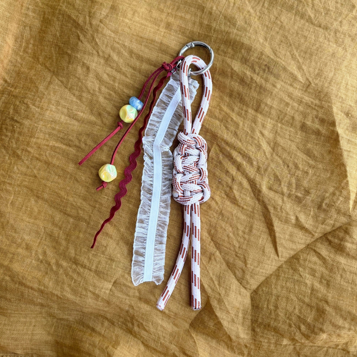 Hand-knotted Paracord Bag Charm With Ribbons - Maroon + Cream