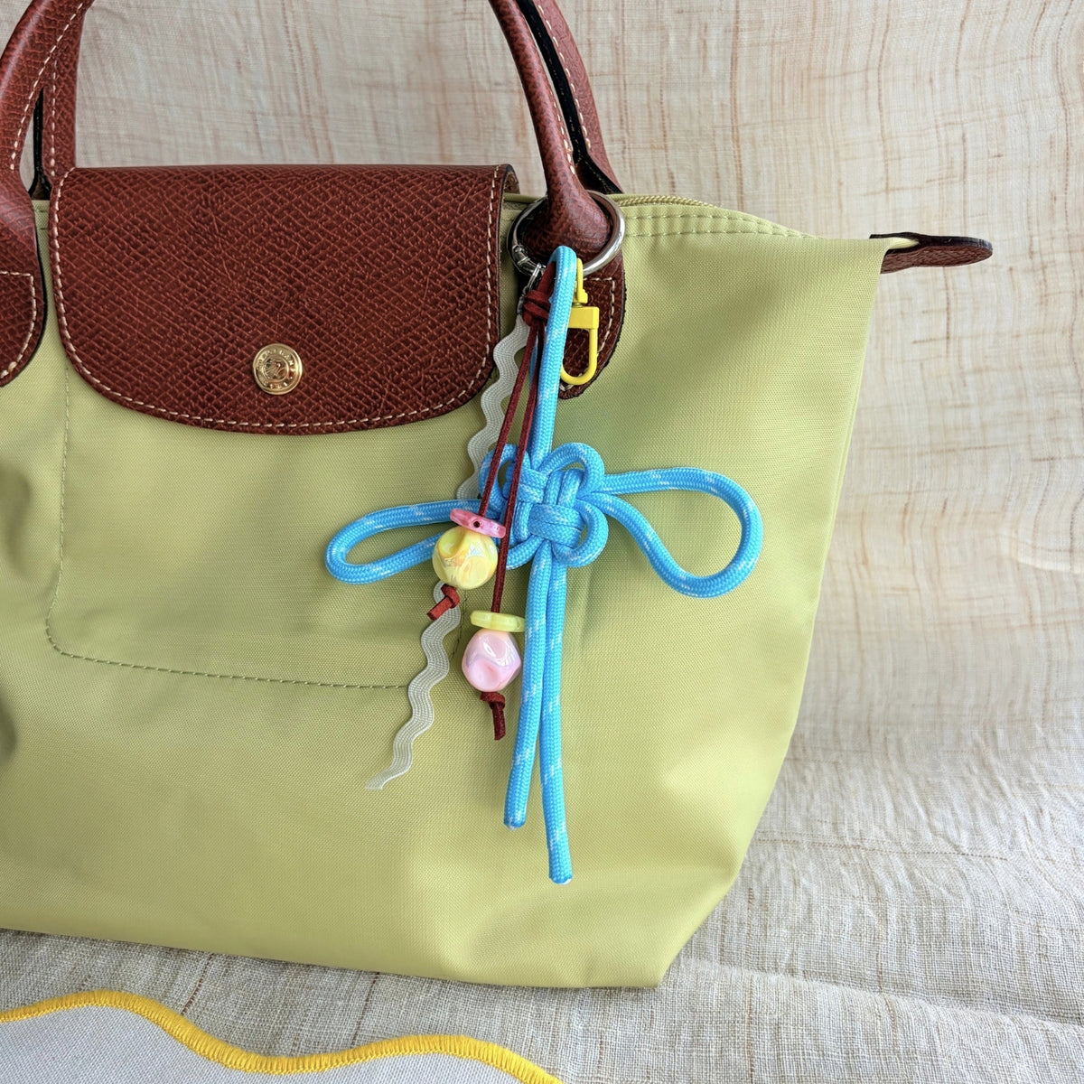 Auspicious Hand-knotted Bag Charm - Light Blue + Ribbon + Yellow Clasp