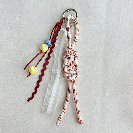 Hand-knotted Paracord Bag Charm With Ribbons - Maroon + Cream