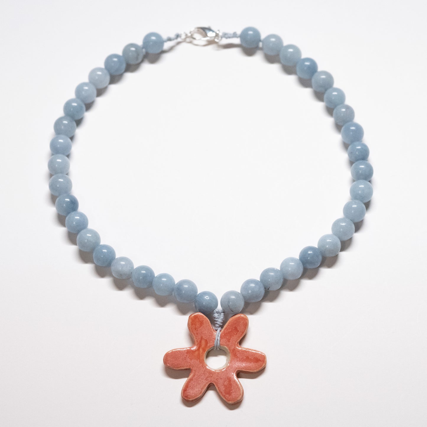 Chunky Blue Beaded Necklace with Pink Ceramic Flower